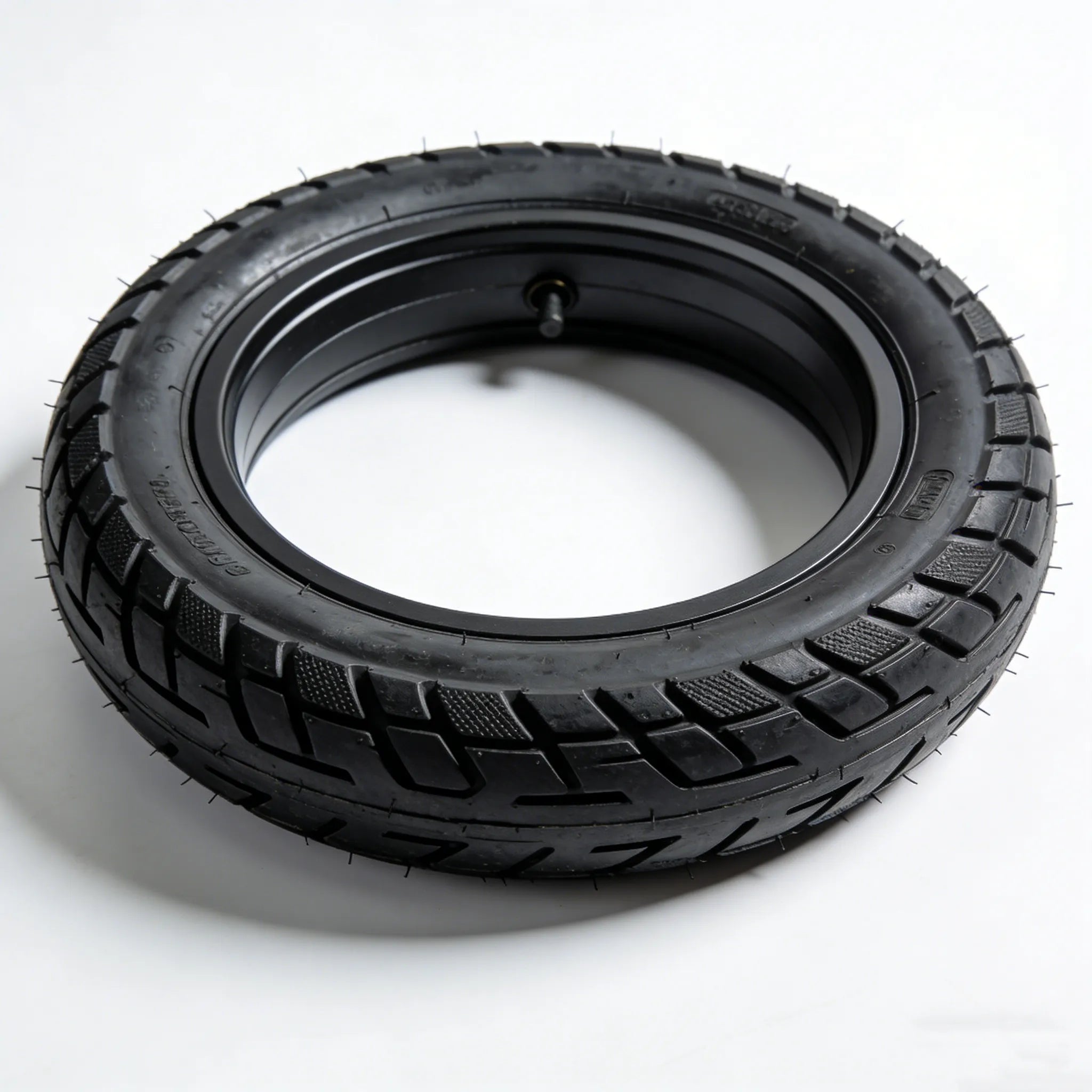 20"×4" fat bike tire inner tube with valve stem, heavy-duty replacement rubber for electric bike, side view showing tread and valve