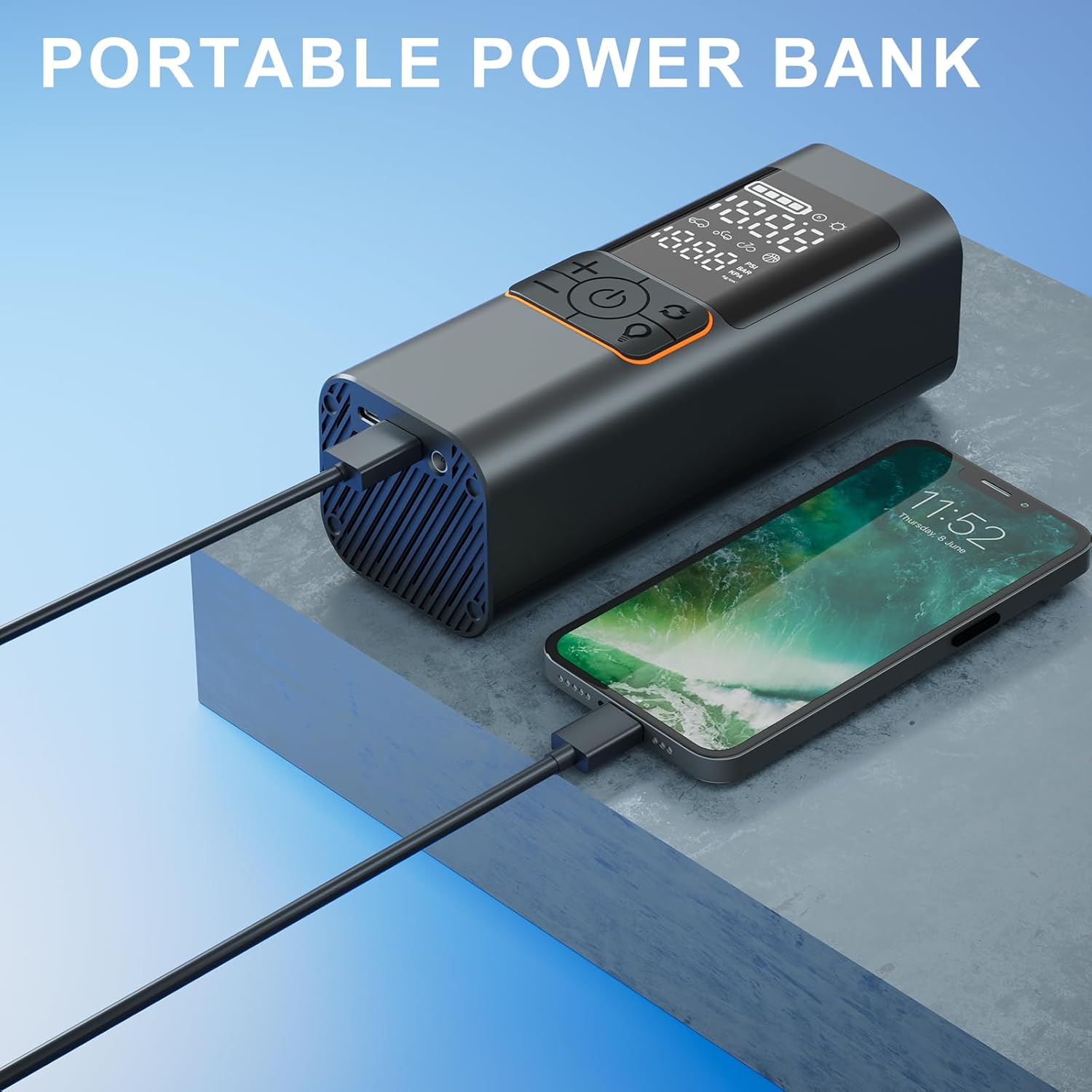Portable power bank charging a smartphone on a blue and gray surface